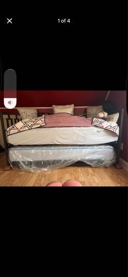 Daybed with 2 Twin Mattress and Trundle.