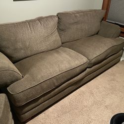 Green Overstuffed Couch And Chair