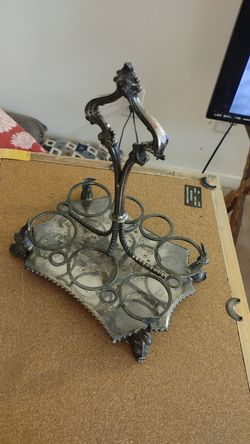 Vintage condiment server with a Chinese dragon fish on each corner