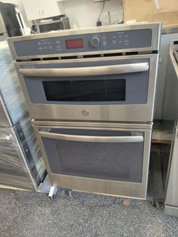 The 27-inch wide oven is brand new; it's a GE brand combo.