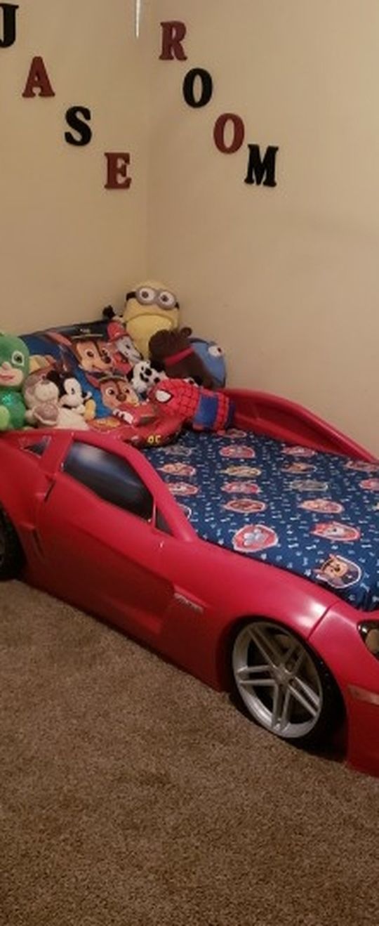 car bed with mattress and toy chest