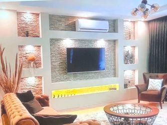 Entertainment centers with fireplace and surround sound