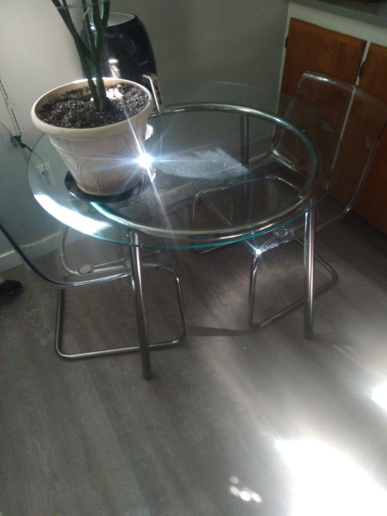 Glass Table And Two Chairs