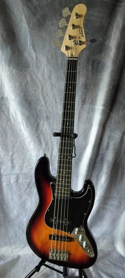 New 5 string electric bass with new gig bag cable and shoulder strap