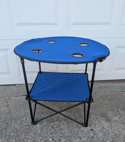 Folding camp table