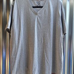 True Religion.
 gray v-neck t-shirt
Size XL  ...it will fits Large 
Pre-owned Excellent condition like new 
This specific shirt features a classic sho