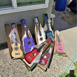 Acoustic guitar 🎸 for kids. 22 inch. $35 each