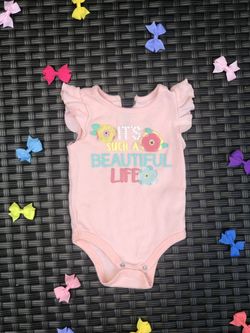 Baby girl onesie size 6M