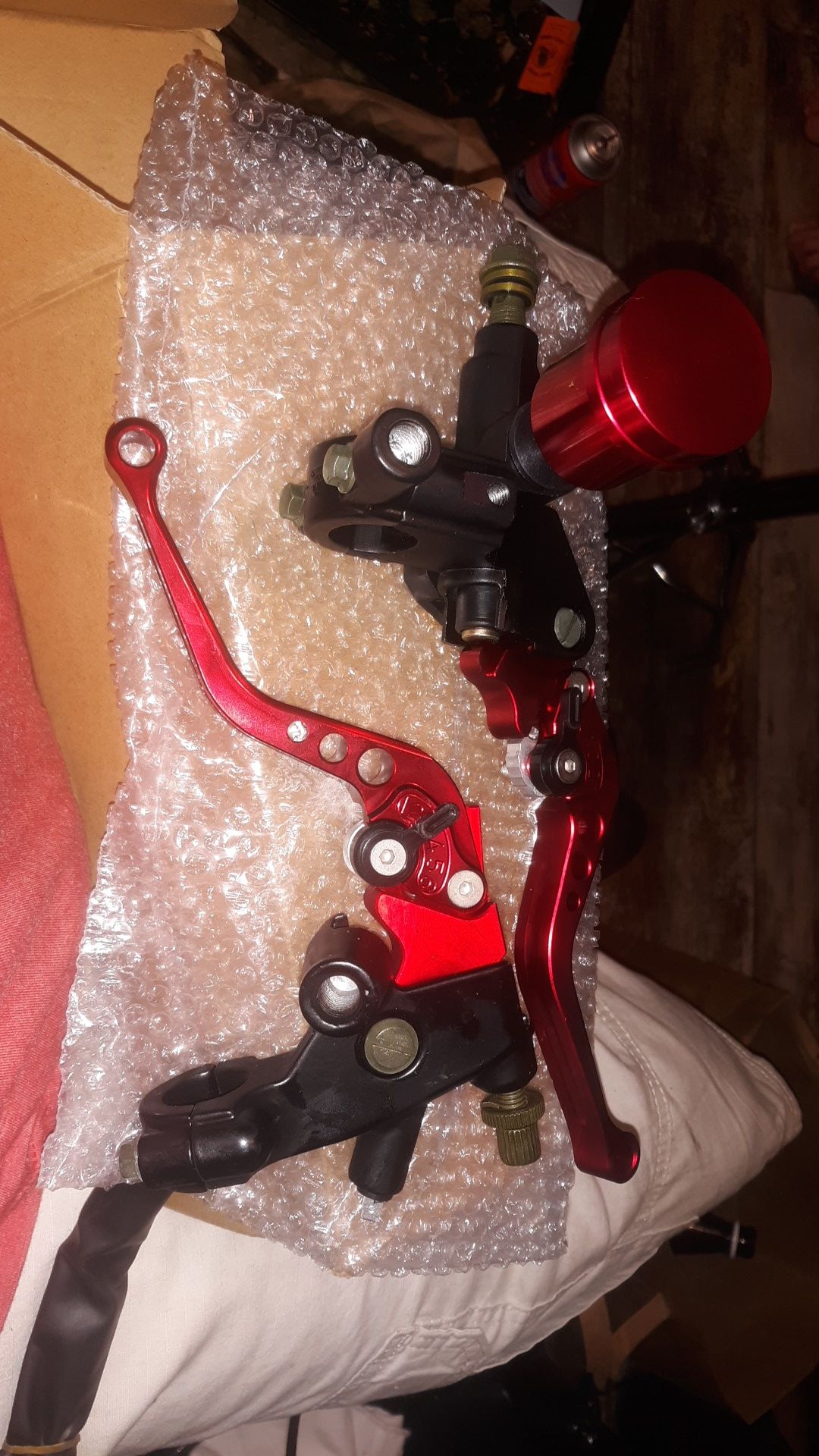 Brand new in the box clutch and brake levers with fluid reservoir