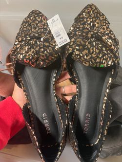 Bin of women’s shoes