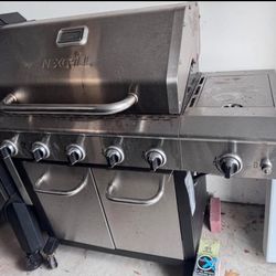 Nexgrill 4-Burner Propane Grill with Side Burner & 2 Propane Tanks