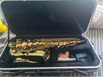 Saxophone with case