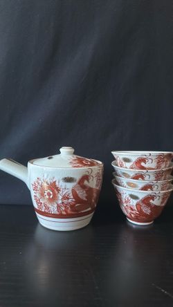 Chinese style teapot with 4 teacups pitch pick up