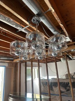 Globe-style bulbs with a mirror-chrome finish Chandelier 