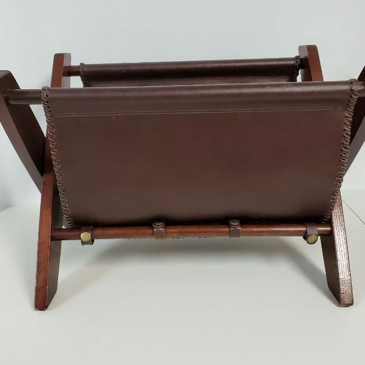 Leather and wood magazine rack Measures; 19 3/4" wide x 13" high From the Marlboro Gear Catalog