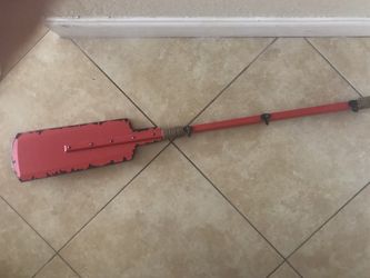 Wooden paddle hanger