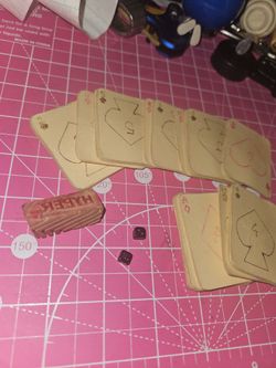 Handmade playing cards/dice.