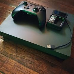 Xbox One X Project Scorpio edition console and batteries, broken disc drive