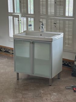 Vanity and cabinet