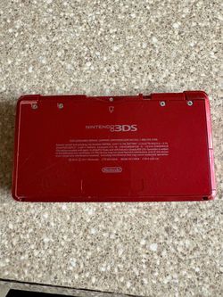 Red Nintendo 3Ds with Luigi’s mansion game/ no charger.
