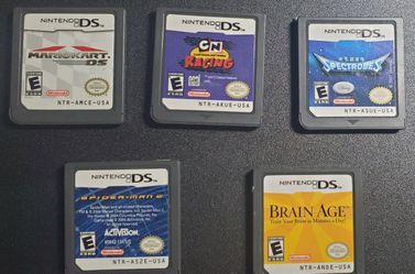 6 games DS with case Spiderman 2, Cartons network racing , Star wars..