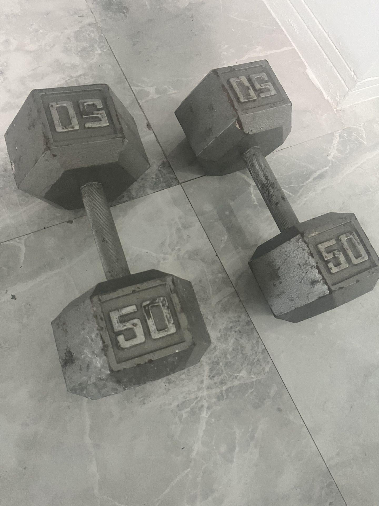 Pair of 50lb steel hex dumbbells total 100lb
