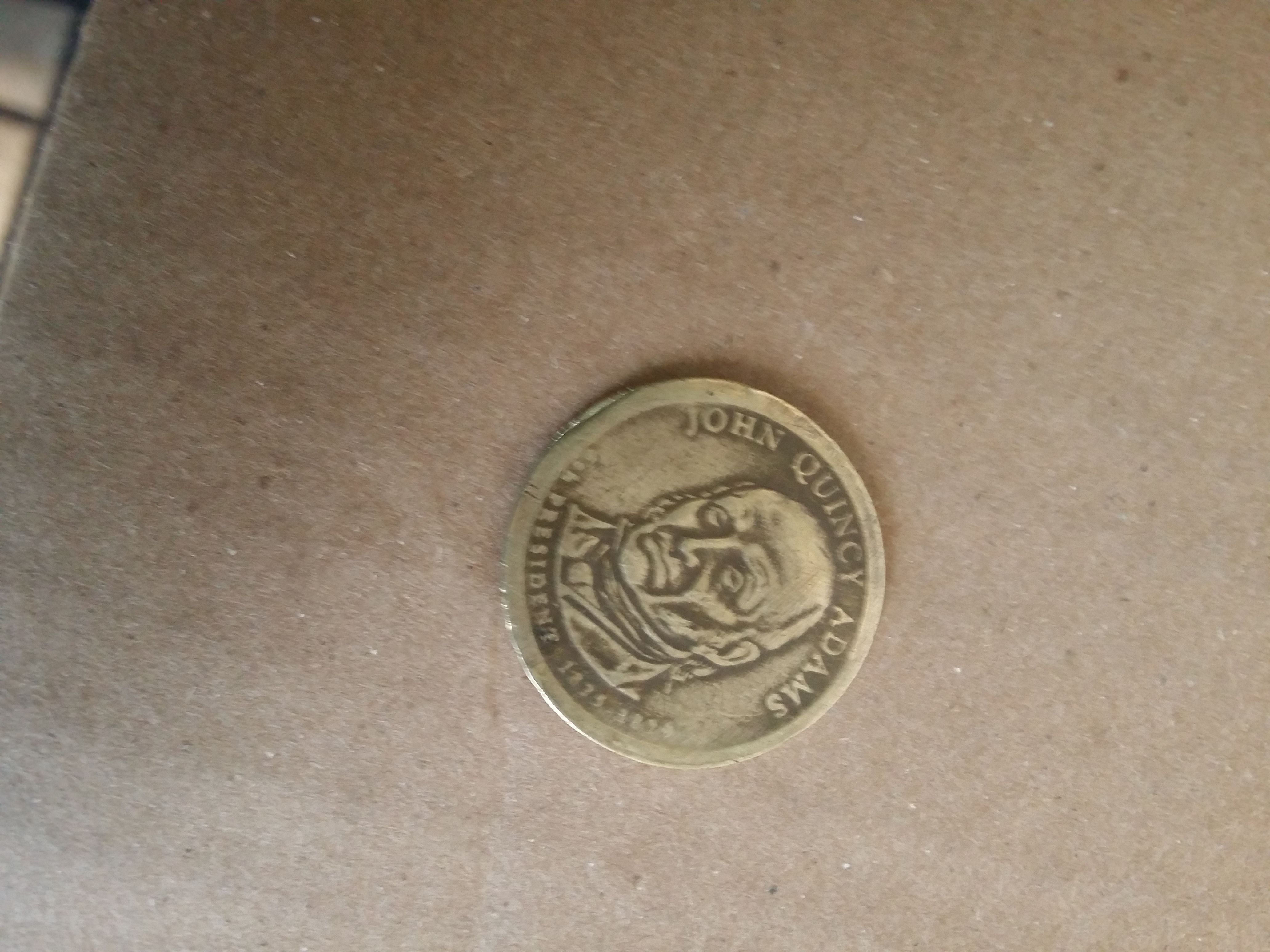 One dollar 1875 coin John Quincy Adams