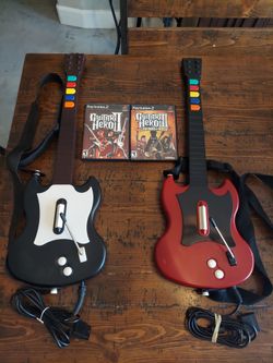 Guitar Hero PS2 Red Octane guitars with games as pictured
