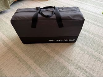 Guava lotus travel crib + plush sheet