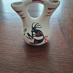Traditional Native American-style ceramic wedding vase featuring a painted figure of Kokopelli