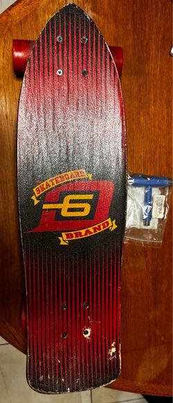 D6 Huntington Beach Skateboard Brand with D6 Wheels and an All-In-One Skateboard Tool