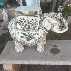 elephant plant holder its 21 inches tall 24 inches wide and 8 inches deep