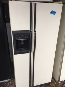 Kenmore side by side refrigerator/ 90 day warranty/ delivery is available