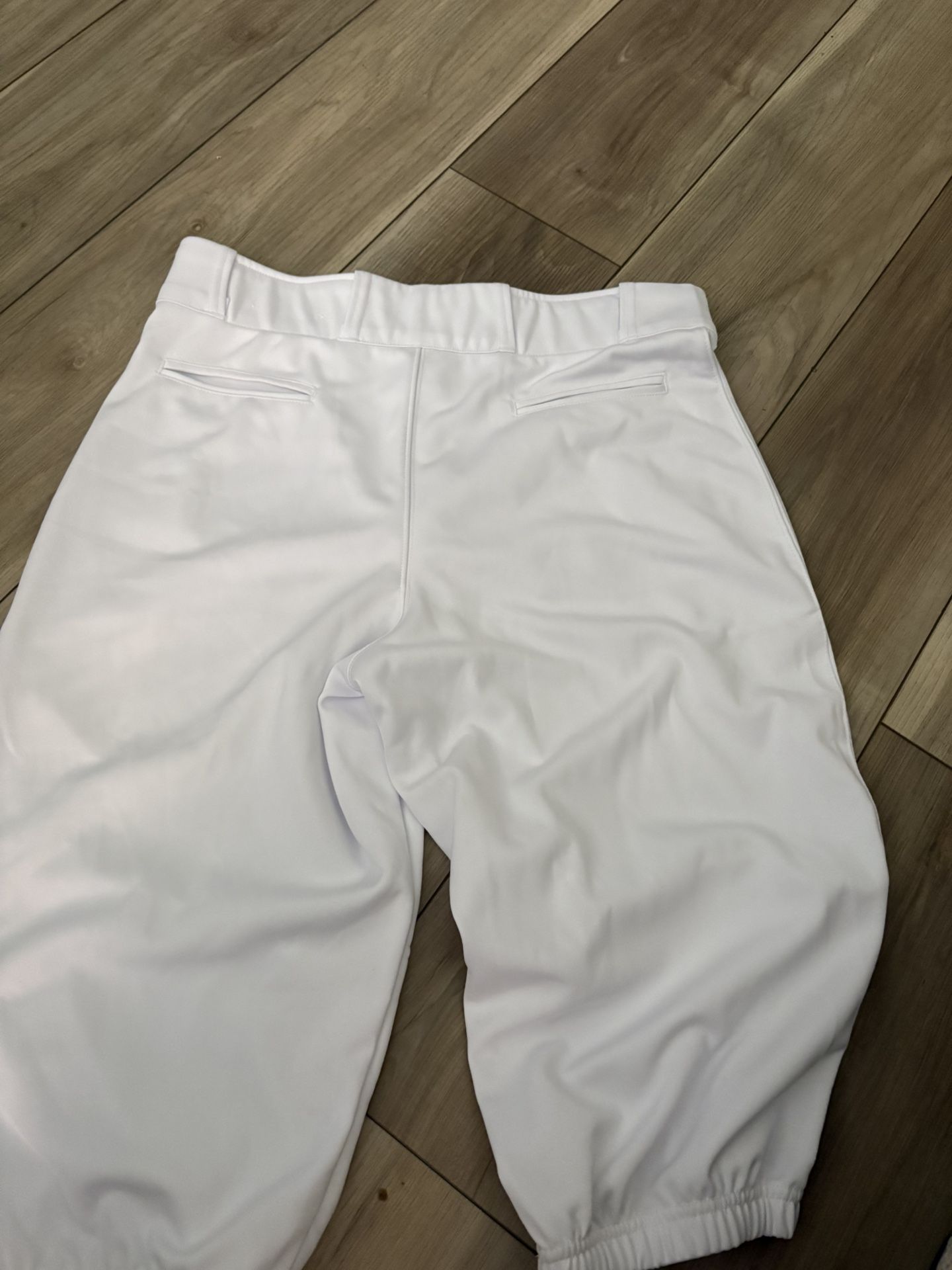 white baseball knicker pants