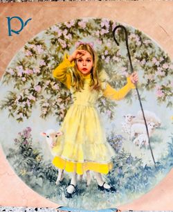 This is a 1983 vintage collector's plate featuring "Little Bo Peep" by artist John McClelland from the Reco International Mother Goose series
