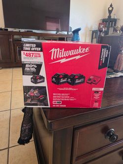 M18 XC. 6.0,  2  batteries  and charger.