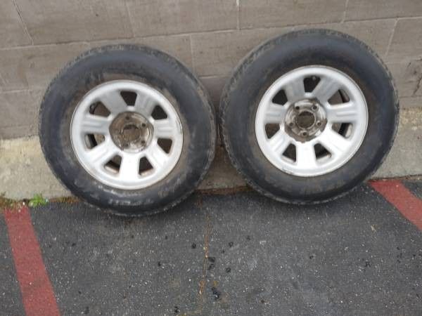 Two Ford ranger 15 inch steel rims 5 on 4.5 steel rims with old tires