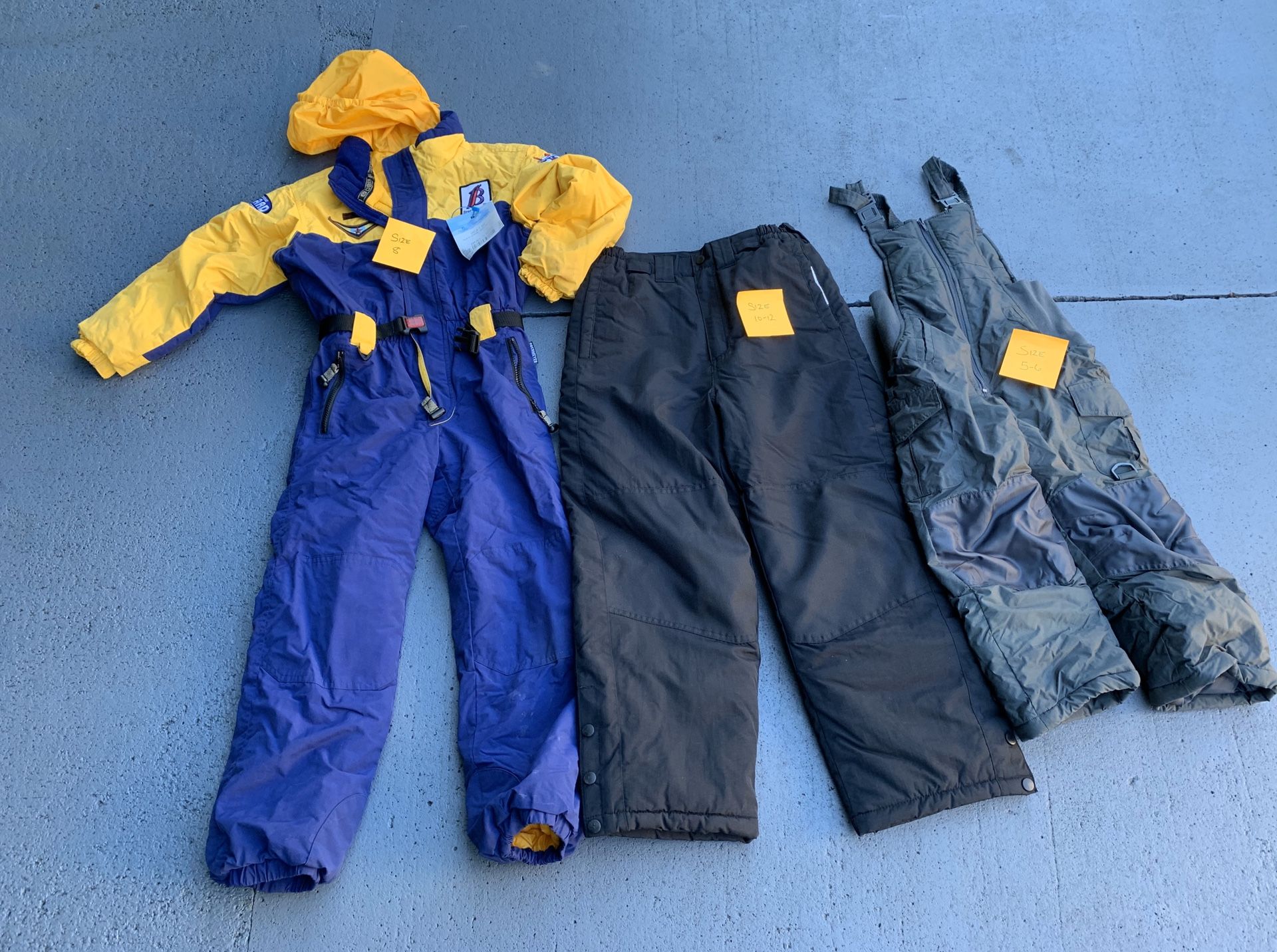 Children’s ski clothes and snow boots various sizes