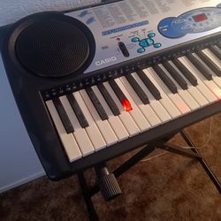 Casio Keyboard And Stand 64 Keys