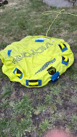 Pull behind inflatable for a boat