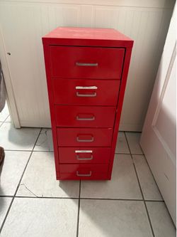 Metal storage cabinet on wheels