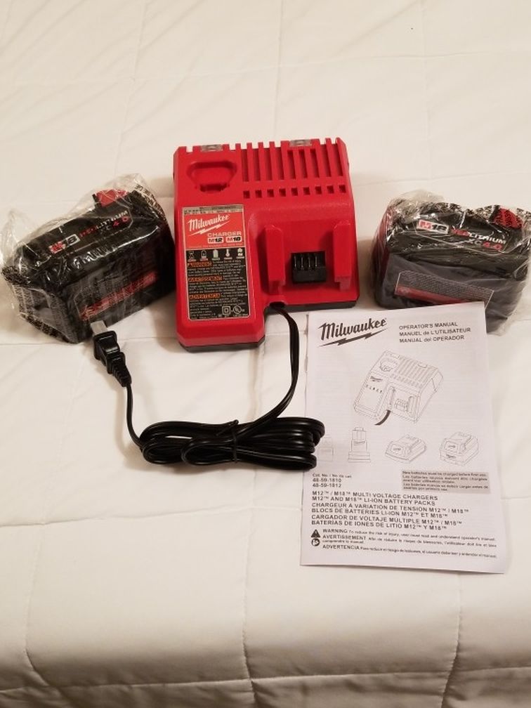 New M18 4 Amp Hour Batteries And Charger