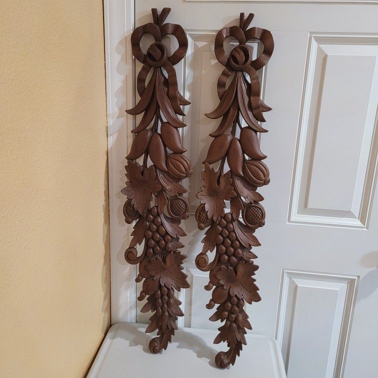 Pair of Wood Carvings wall decoration. 42" long.