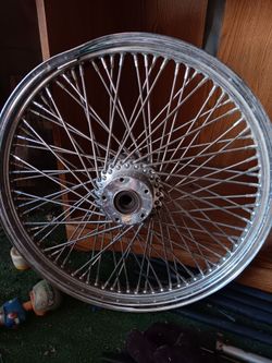 21" + 24 spoke rim.