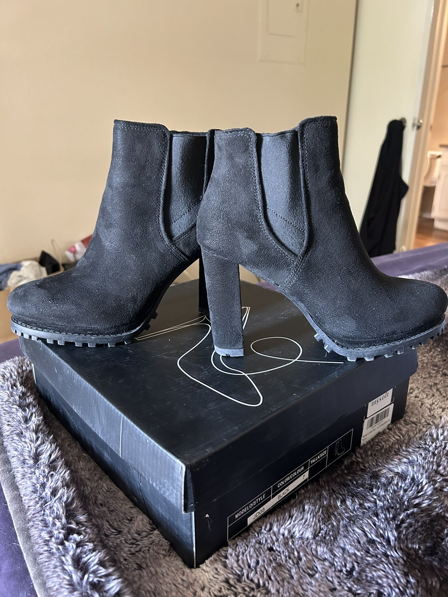Beautiful Woman’s black Boots