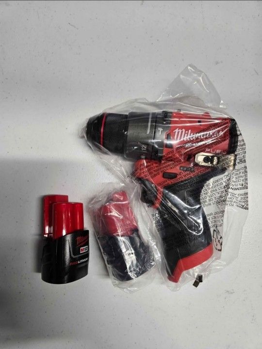 Milwaukee M12 FUEL Hammer Drill And Batteries FIRM PRICE