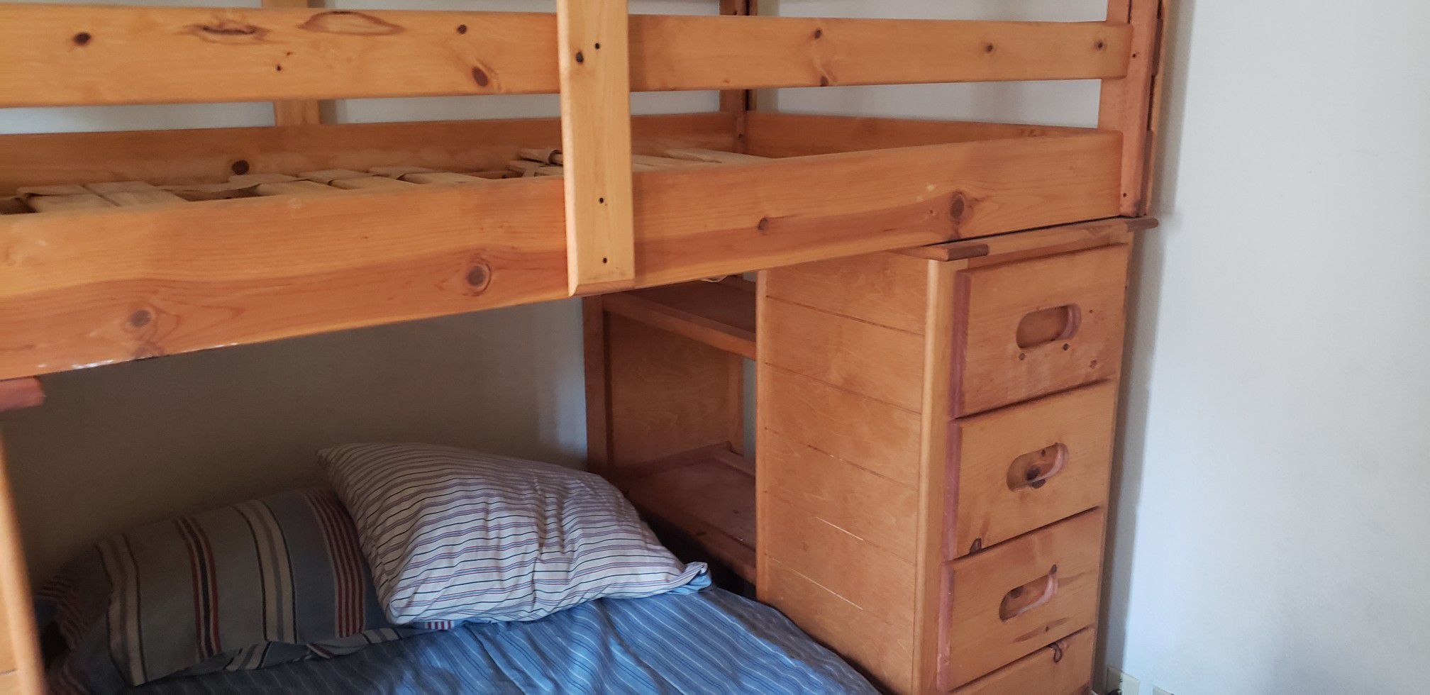 Bunk bed with built in desk, dresser, TV stand, small tv