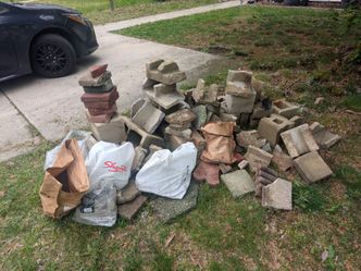 $50 cash to remove this.  All cinderblock, the bags are little  pieces. Text (contact info removed)