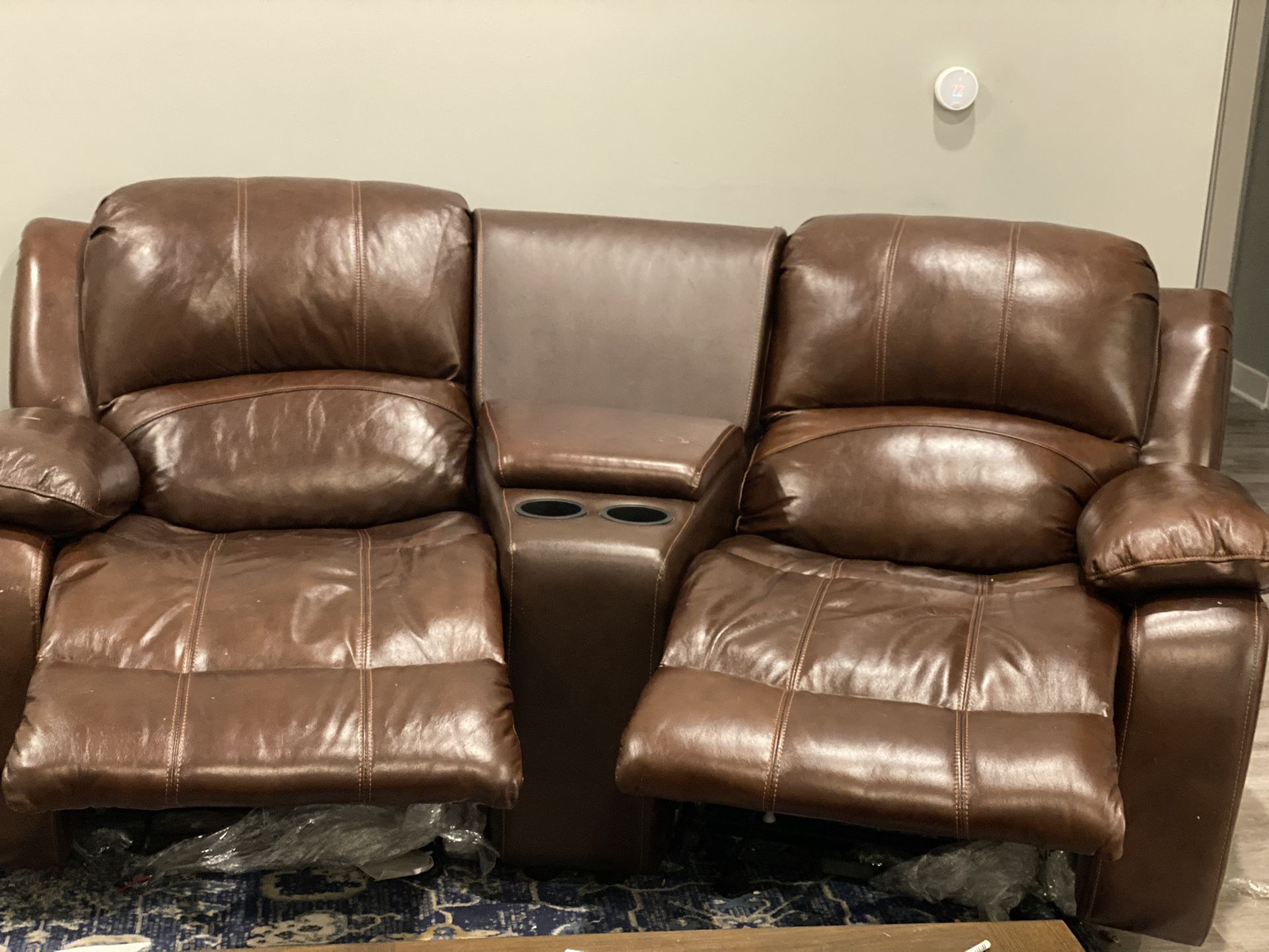 70” Wide Modern Breathable Leather Manual Reclining Loveseat with Cup Holders  Pickup location- Cary NC  CASH Only 