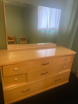 Dresser with a mirror